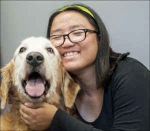 Golden Retriever named Rocket with student