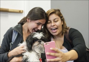 Sparky dog and students taking a selfie