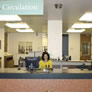 Student at the old circulation desk.
