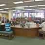 Students getting research help at the old reference desk.