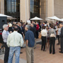 Guests populate the front of the library during the reception