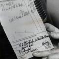 A receipt for the dynamite used to destroy the Overell yacht. The slip shows the falsified signature used by Gollum upon the purchase.