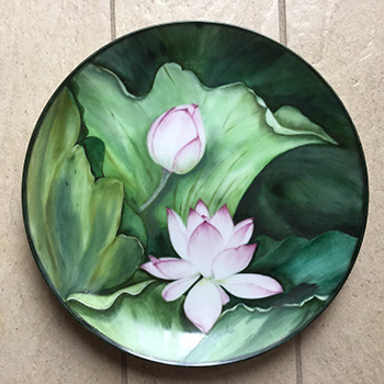 Flowers painted on porcelain plate.