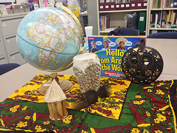 A globe, toys, and other learning materials from the Teacher Curriculum Center