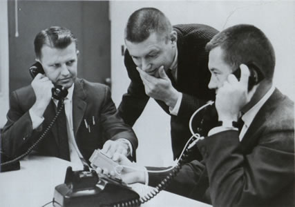 NORM TULLEY, DOUGLAS BURKE AND HERB LARSON LEARN HOW TO USE THE SPEECH INDICATOR FOR THE DEAF