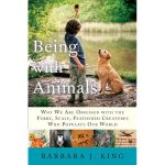 Book cover for "Being with Animals," cover photo features young child playing with a yellow labrodor puppy outdoors.