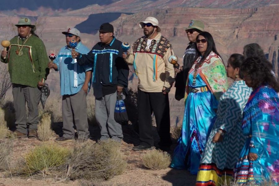 Members of the Hualapai Nation stand on the ridge of the Grand Canyon