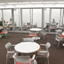 New furniture and glass walled group study rooms.