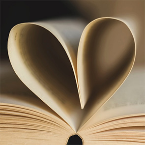 Book with pages folded into a heart shape.