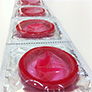 Red condoms in packaging