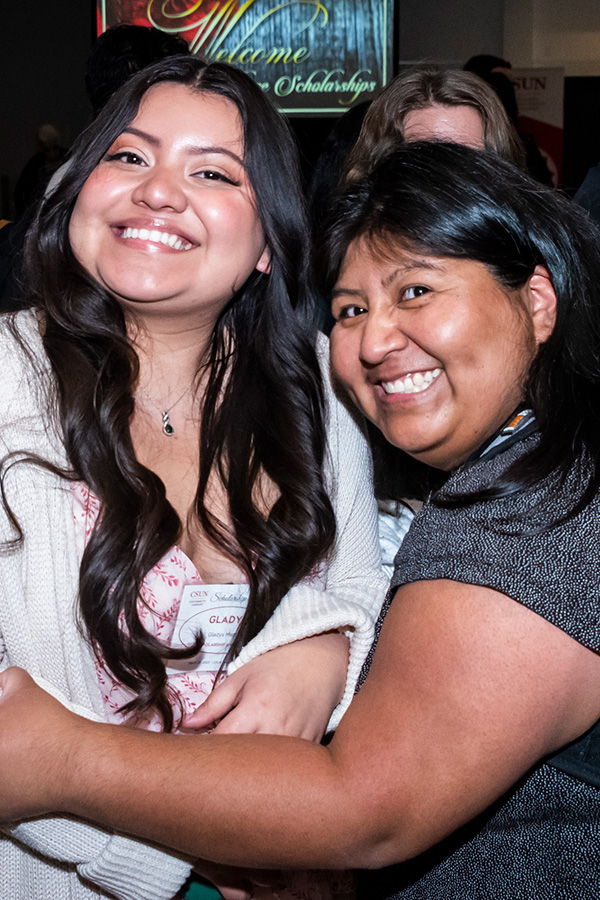 Student and Supervisor at the University Library Scholarship Ceremony