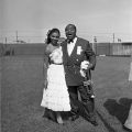 Louis Armstrong and Clara Yaeju posing together at the 9th Annual Cavalcade of Jazz. Cavalcade of Jazz, 1953, Charles Williams Collection
