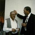 Photograph, Bobby Bradford and Morgan Freeman socializing at a Double M Jazz Salon, 1996