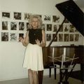 Photograph, Mimi Melnick welcoming guests to the Double M Jazz Salon, July 23, 2000