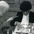 Save Autistic Children Telethon hostess interviews a woman regarding her art, circa 1978.