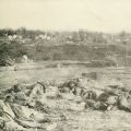 Photograph, Confederate dead gathered at the bottom of the parapet of Battery Robinett 