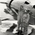 Charles and Anne Lindbergh beside their Lockheed Sirius, ca. 1930