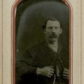 Tintype in a paper frame. Nineteenth Century Photograph Collection