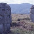 Two stone statues standing at the Quebradillas site of San Agustín Archaeological Park. Photo taken in 1975. Digital ID: 99.01.RCr.sl.B17.04.26.16