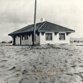  Southern Pacific Railroad Station in Van Nuys surrounded by water during a flood, 1914