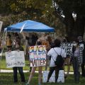 Unidentified individuals hold handmade posters during a demonstration in honor of Breonna Taylor held near Tapo Canyon and Alamo Street, Simi Valley, 2020, KRT.D.B1.9.4656