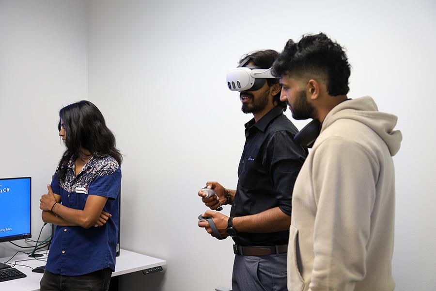 CSUN students trying out the CMS virtual reality headset