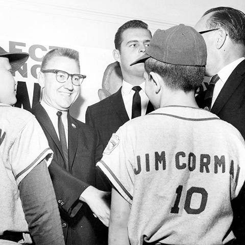 James Corman introduces Don Drysdale, a Van Nuys native and pitcher for the Los Angeles Dodgers, to members of the Canoga Park Tigers Little League Baseball team, ca. 1963. James C. Corman Collection.