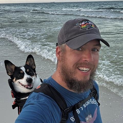 CSUN University Library Associate Dean Jordan Nielsen and dog Huckleberry