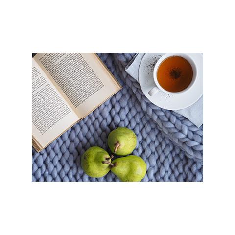a book, pears and a cup of tea