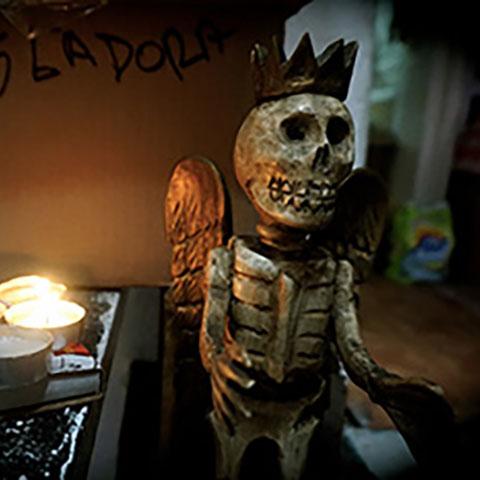 Figure of Santa Muerte (Saint Death) - from Dr. Laura Roush' event Offerings from Prison: A Collaborative Photo Essay at a Santa Muerte Altar