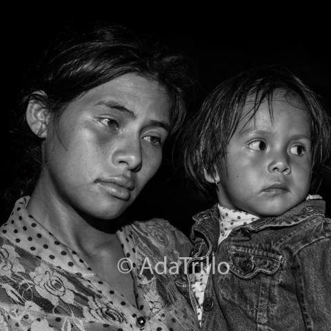 Mother and daughter looking exhausted. 