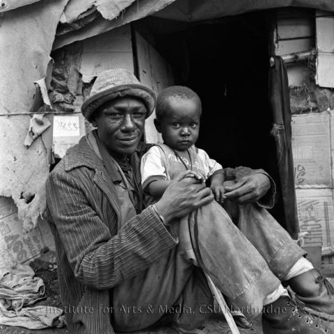 A man holding a child.