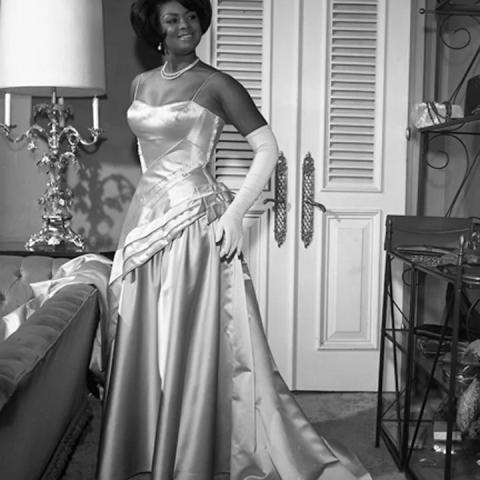A woman in a evening gown