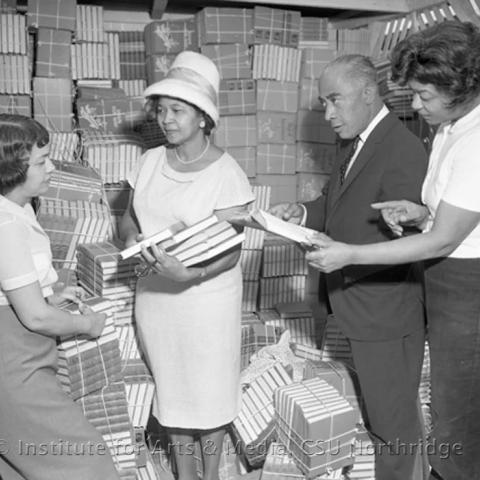 a few people with books in their hands