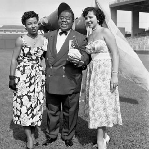 Two women with a man
