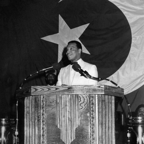 a man speaking on the podium.