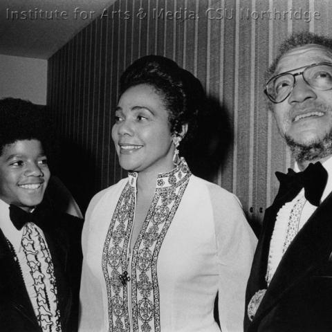 Two men and a woman