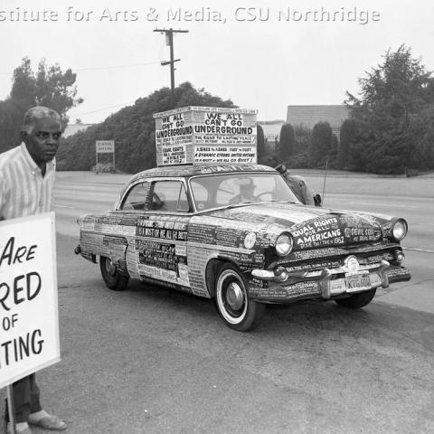 A car with a lot of messages written on it
