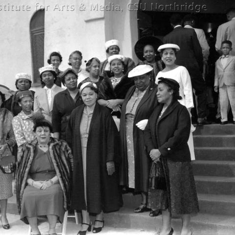 Group of women standing on the stairs