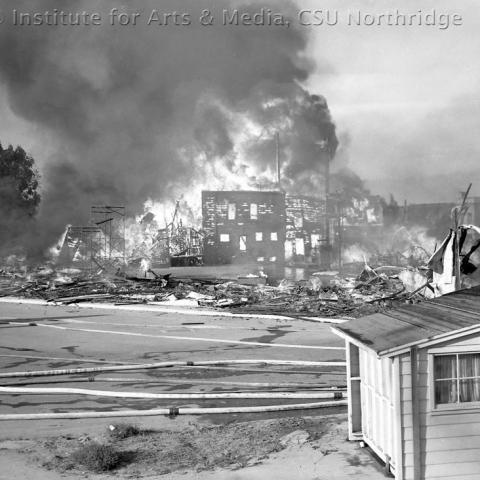 A fire burning down buildings.