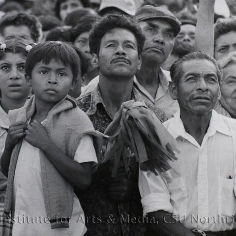 People listening to a speech.