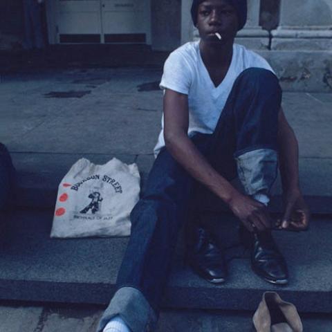 A boy changing his shoes