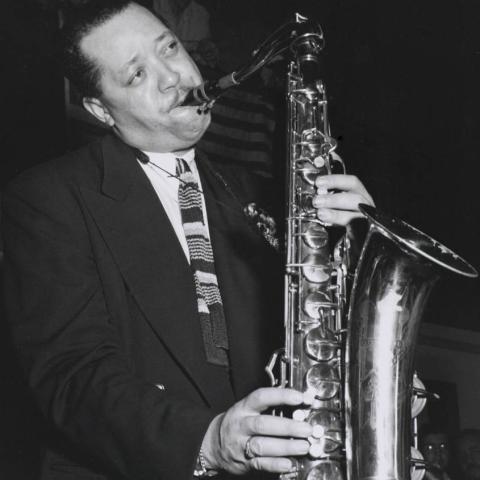 A man playing the saxophone