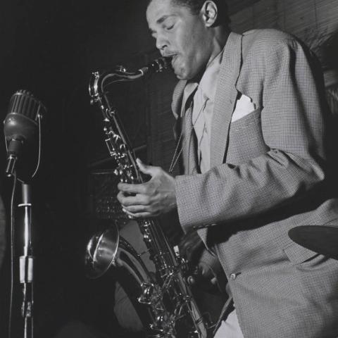 A man playing the saxophone