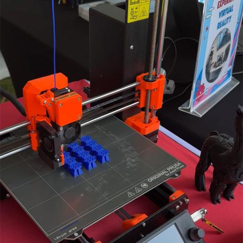 Prusa 3D printer printing something blue
