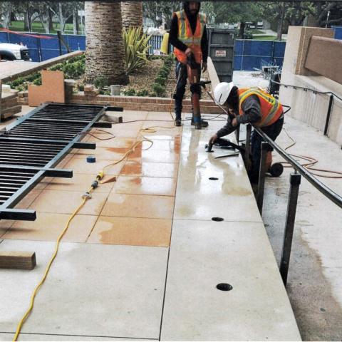 Crews working on getting new railing installed.