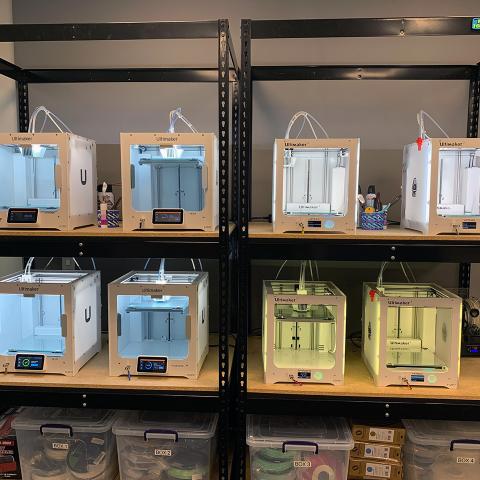 Rack of 8 3D printers at the Creative Maker Studio at CSUN's University Library