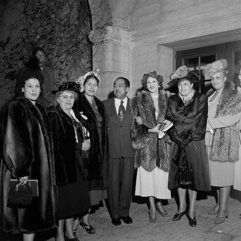 Image of Langston Hughes, Juanita Miller, and Dorothy Vena Johnson with others