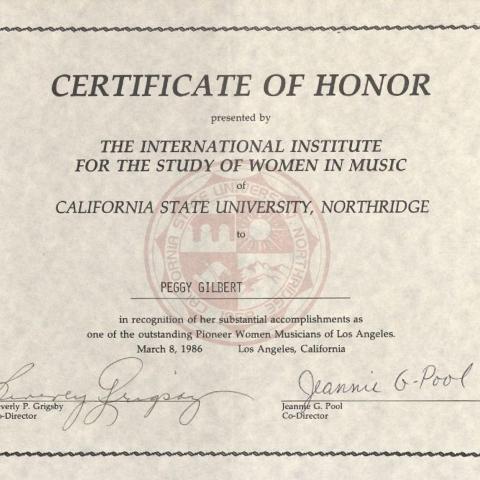 Certificate of honor presented to Peggy Gilbert by the International Institute for the Study of Women in Music, March 8th, 1986