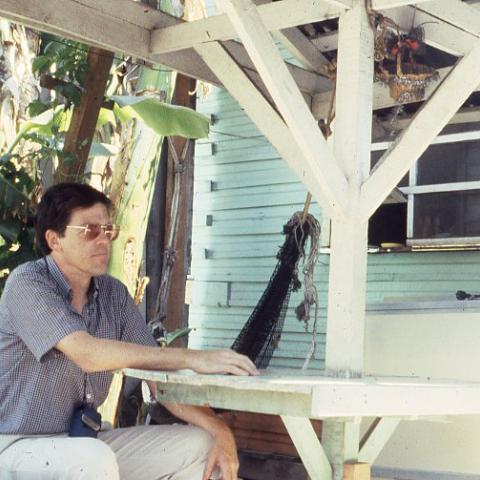Michael Emery sitting for a photo in Costa Rica during one of his Central American trips. ca. 1985-1986. Box 3, Folder 1